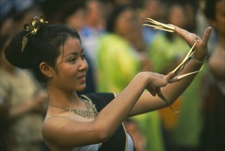 THAILAND, Chiang Mai, Wat Phra Singh, Traditional Thai fingernail dancer performing