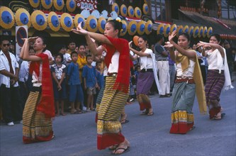 THAILAND, Chiang Mai, Baw Sang, Dancers in traditional northern Thai attire performing traditional