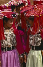 THAILAND, Chiang Rai Province, Huai Khrai, Lisu women dressed in their New Year finery turned
