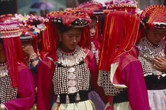 THAILAND, Chiang Rai Province, Huai Khrai, Lisu women dressed in their New Year finery