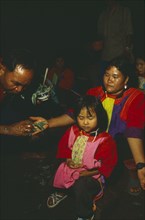 THAILAND, Chiang Rai Province, Doi Lan, New Year. Lisu Shaman performing ceremony to cure villages