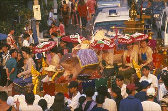 THAILAND, Chiang Mai, Songkran aka Thai New Year festival parade to Wat Phra Singh with floats