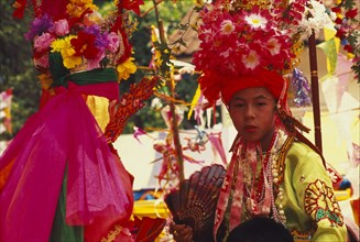 THAILAND, Chiang Mai, Shan Poi San Long. Crystal Children ceremony with Luk Kaeo in costume at