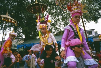 THAILAND, Chiang Mai, Shan Poi San Long. Crystal Children ceremony with Luk Kaeo in costume being