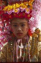 THAILAND, Chiang Mai, Shan Poi San Long. Crystal Children ceremony with portrait of Luk Kaeo in