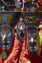 THAILAND, Loei Province, Dan Sai, Phi Ta Khon or Spirit Festival. People wearing brightly coloured