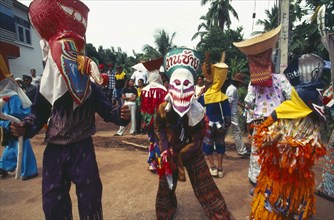 THAILAND, Loei Province, Dan Sai, Phi Ta Khon or Spirit Festival. People in spirit costumes during