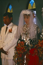 MYANMAR, Kachin State, Myitkyina, Jinghpaw wedding with Bride and Groom at Geis memorial church