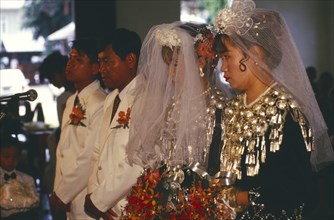 MYANMAR, Kachin State, Myitkyina, Jinghpaw wedding with Bride and Groom at Geis memorial church