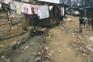 KENYA, Nairobi, "Village One, Mathare Valley.  Children living in squalid and dangerous slum area