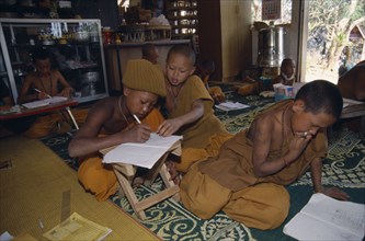 THAILAND, Wat Phra Acha Tong, Young novice Buddhist monks from The Golden Horse Forest Monastery