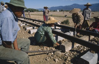 MYANMAR, Transport, Making repairs to the single railway track on the Mandalay to Myitkyina line.
