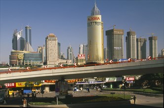 CHINA, Shanghai, "View of Pudong from the Bund.  Elevated roadway, shops and skyscrapers."
