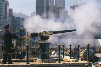 CHINA, Shanghai, Firing the Noon Day Gun on the Causeway Bay waterfront.