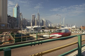 CHINA, Hong Kong, Elevated highway with Causeway Bay and city skyline behind.