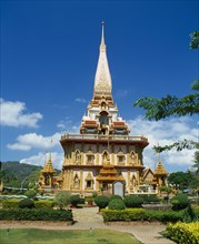 THAILAND, Phuket Province, Wat Chalong, Highly decorative Buddhist temple exterior.