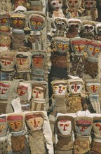 ECUADOR, Imbabura, Otavalo, Textile dolls on sale in craft market.