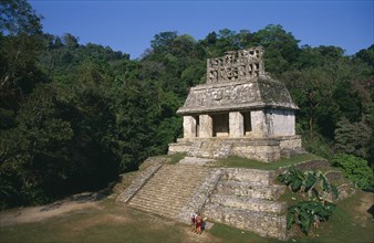 MEXICO, Chiapas, Palenque, Mayan ruins dating from 600 to 900 AD.  Temple of the sun with tourist