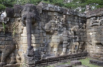 CAMBODIA, Angkor, The Terrace of the Elephants.  Detail of relief carving.
