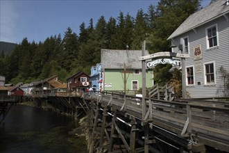 USA, Alaska, Ketchikan, View along Creek Street waterside houses and wooden walkway on propped up