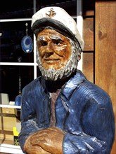 USA, Alaska, Seward, Carved wooden statue of a Captain with a beard