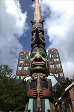 USA, Alaska, Ketchikan, Angled view of carved wooden Totem pole in the Totem Park