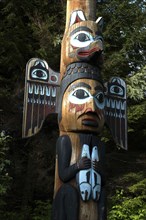 USA, Alaska, Ketchikan, Detail of carved wooden Totem pole in the Totem Park