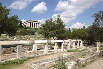 GREECE, Athens, Ancient Agora ruins with the Temple of Hephaestus in the distance
