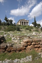 GREECE, Athens, View over the Ancient Agora ruins toward the hilltop Temple of Hephaestus