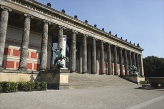 GERMANY, Berlin, Old Museum columned facade with statues either side of the steps