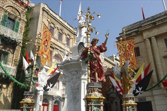 MALTA, Vittoriosa, Statues and decorative banners during the Birgu Feast