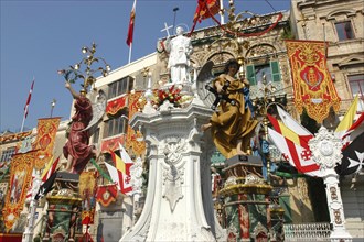 MALTA, Vittoriosa, Statues and decorative banners during the Birgu Feast