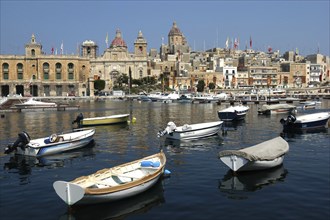 MALTA, Vittoriosa, View over moored boats toward waterfront architecture of the town