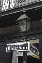 USA, Louisiana, New Orleans, French Quarter. Lamp post and Rue Bourbon street sign