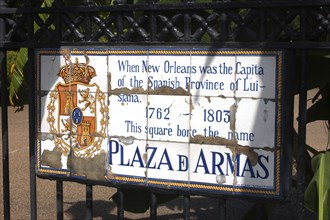 USA, Louisiana, New Orleans, French Quarter. Tiled plaque on wrought iron gate of the historically