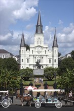 USA, Louisiana, New Orleans, French Quarter. St Louis Cathedral on Jackson Square with horse drawn