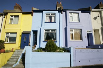 ENGLAND, East Sussex, Brighton, Brightly coloured terraced houses on Bear Road