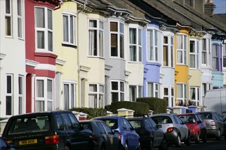 ENGLAND, East Sussex, Brighton, Brightly coloured terraced houses in Hanover area
