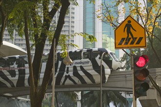 MALAYSIA, Kuala Lumpur, City centre monorail and pedestrian crossing sign
