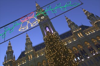 AUSTRIA, Vienna, Christmas lights and tree in front of the Rathaus during the Christmas Market.