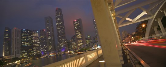 SINGAPORE, , View of the skyscrapers along The Singapore River from Elgin Bridge at dusk.