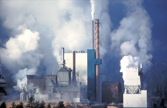 CANADA, British Columbia, Skookumchuck, Papermill emitting smoke and steam