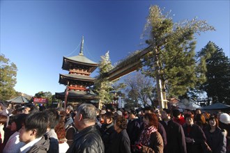 JAPAN, Honshu, Chiba , "Narita San Temple. New Years Holiday worshippers crowd the front court of