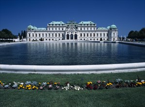 AUSTRIA, Vienna, Upper Belveder Palace southern facade seen over large pool in the gardens