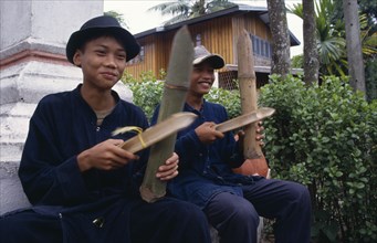 LAOS, Luang Prabang, Young musicians playing bamboo instruments.