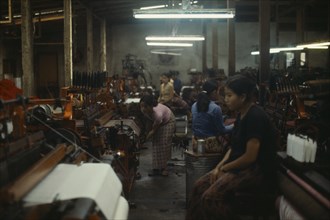 LAOS, Industry, Clothing, Female labour in sweatshop textile factory.
