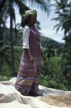 INDONESIA, Sumatra, People, Full length portrait of woman wearing traditional dress.
