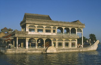CHINA, Hebei, Beijing, The Summer Palace.  Visitors on the Marble Boat on Kunming Lake.