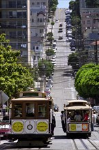 USA, California, San Francisco, View of cable cars on Taylor Street with view up to Nob Hill beyond