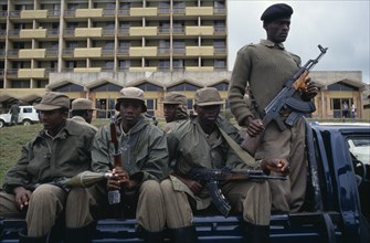 RWANDA, Kigali, RPF Troops outside parliament building carrying guns and rocket launchers
